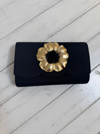 Ruby Scalloped Clutch in Black with Gold Poppy Black Pouf Motif