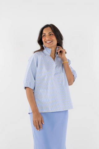 Blue striped blouse Emily McCarthy