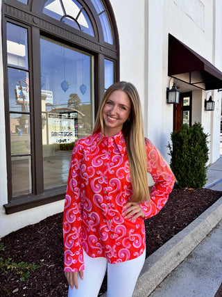 Pink and red retro patterned button down blouse with collar