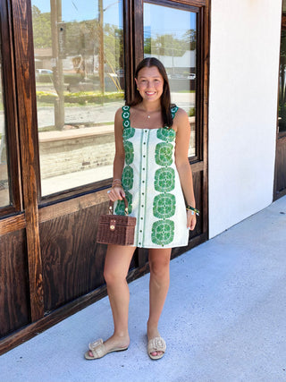 Green and cream mini dress with crochet flowers on the straps