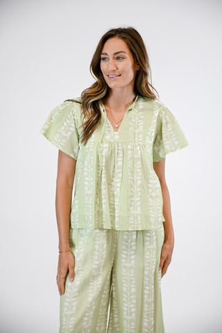 Green floral short sleeved blouse